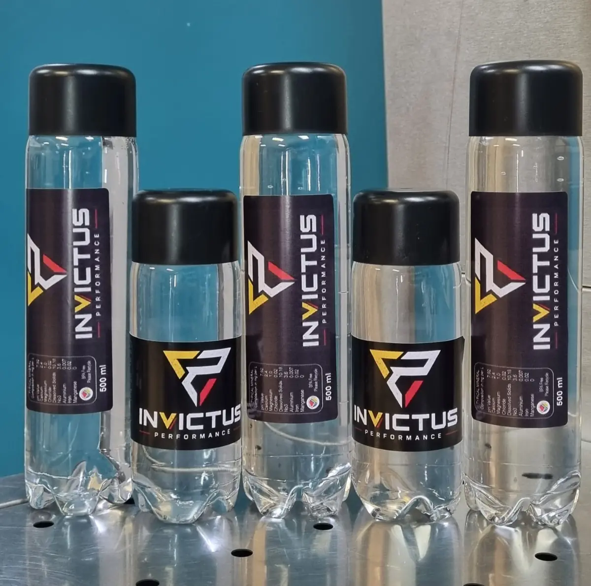Invictus Performance custom branded water bottles for a gym and fitness brand